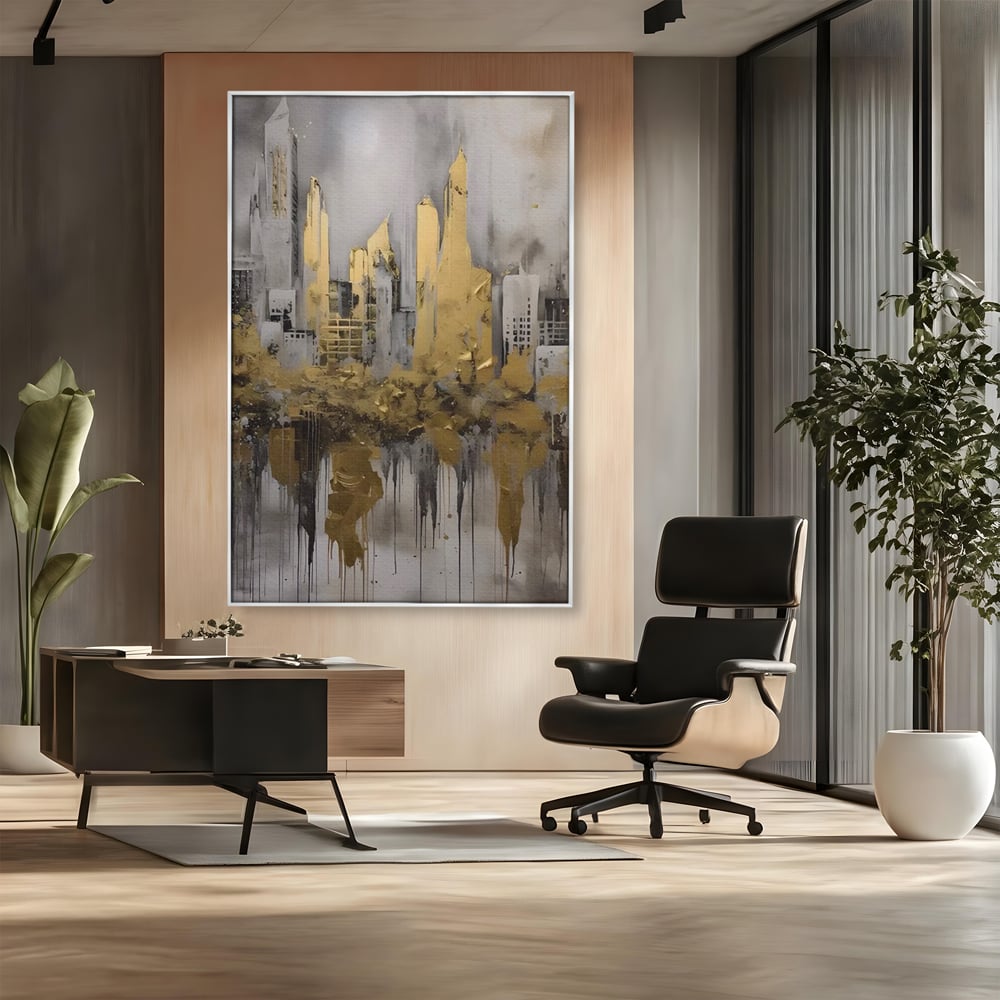 Tablou canvas cu tablou canvas cu zgarie-nori aurii, in rama de aluminiu argintiu, pe perete intr-un birou